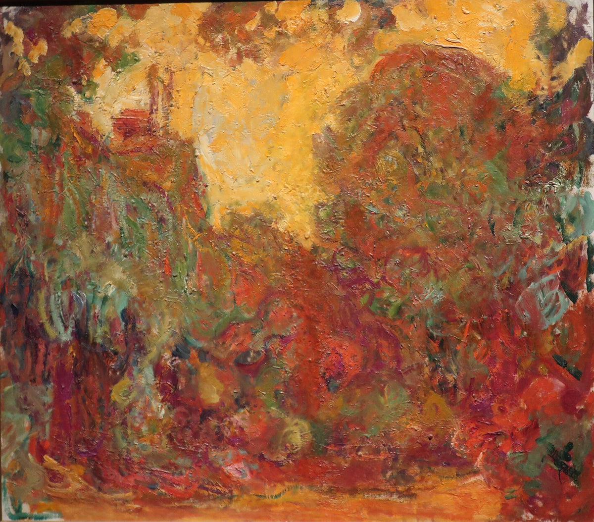 The house seen from the rose garden by Claude Monet